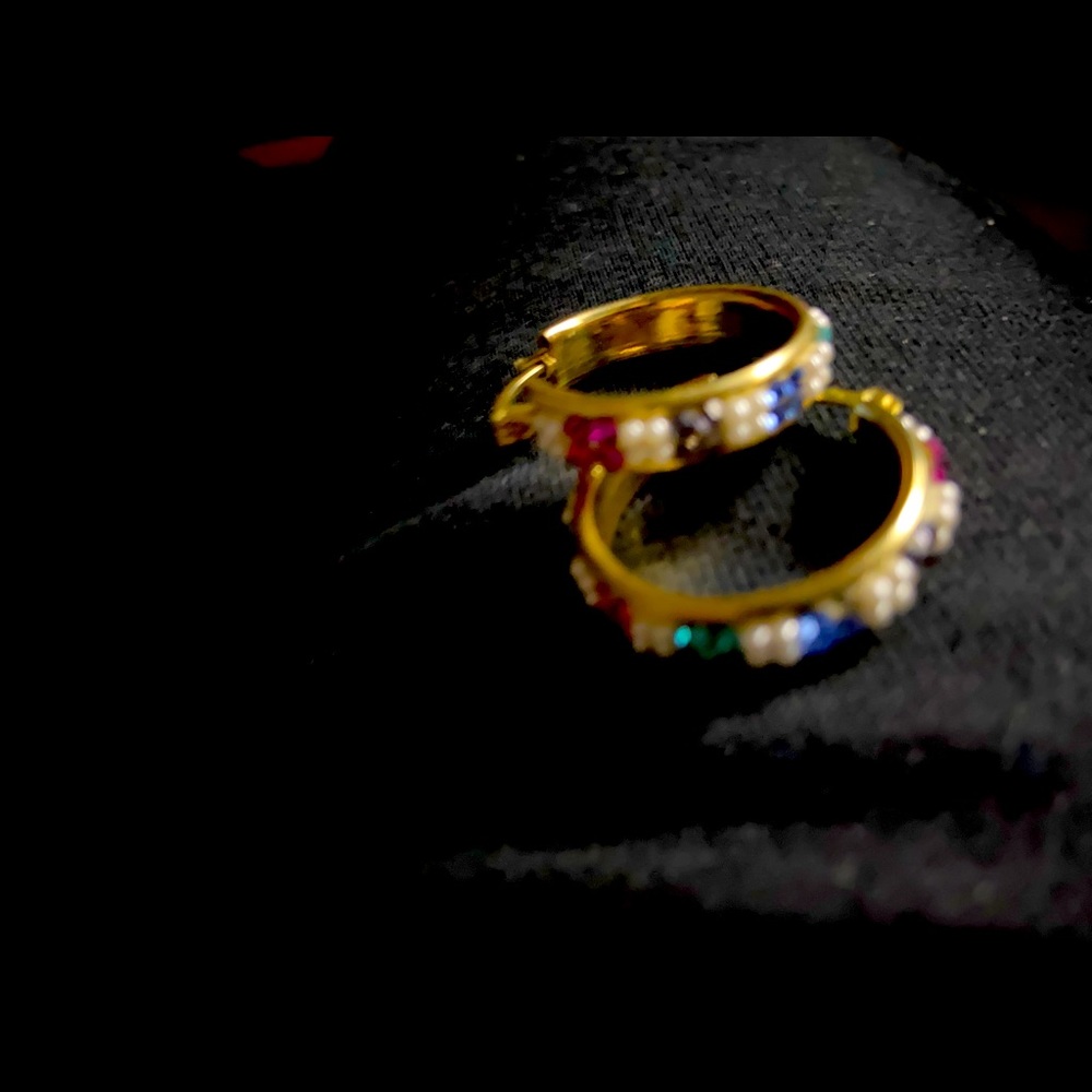 Beautiful earrings gold filled with different color stones.